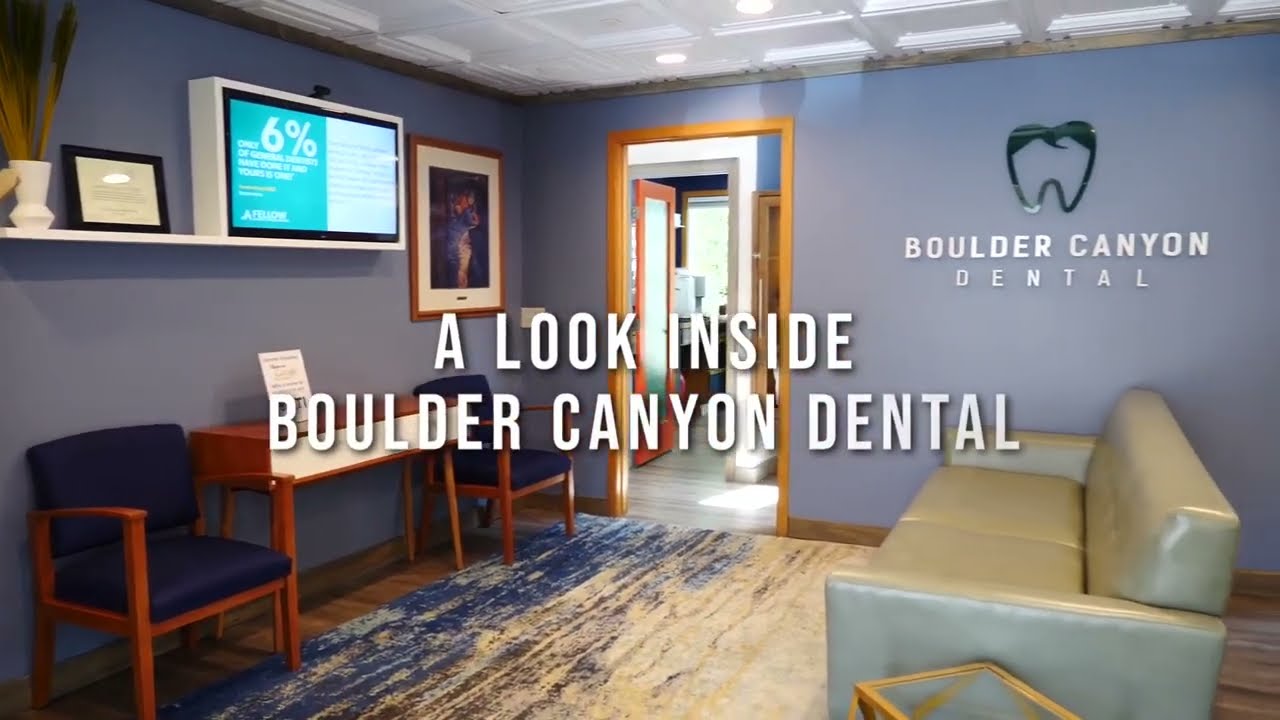 Waiting room of Boulder Canyon Dental with office signage